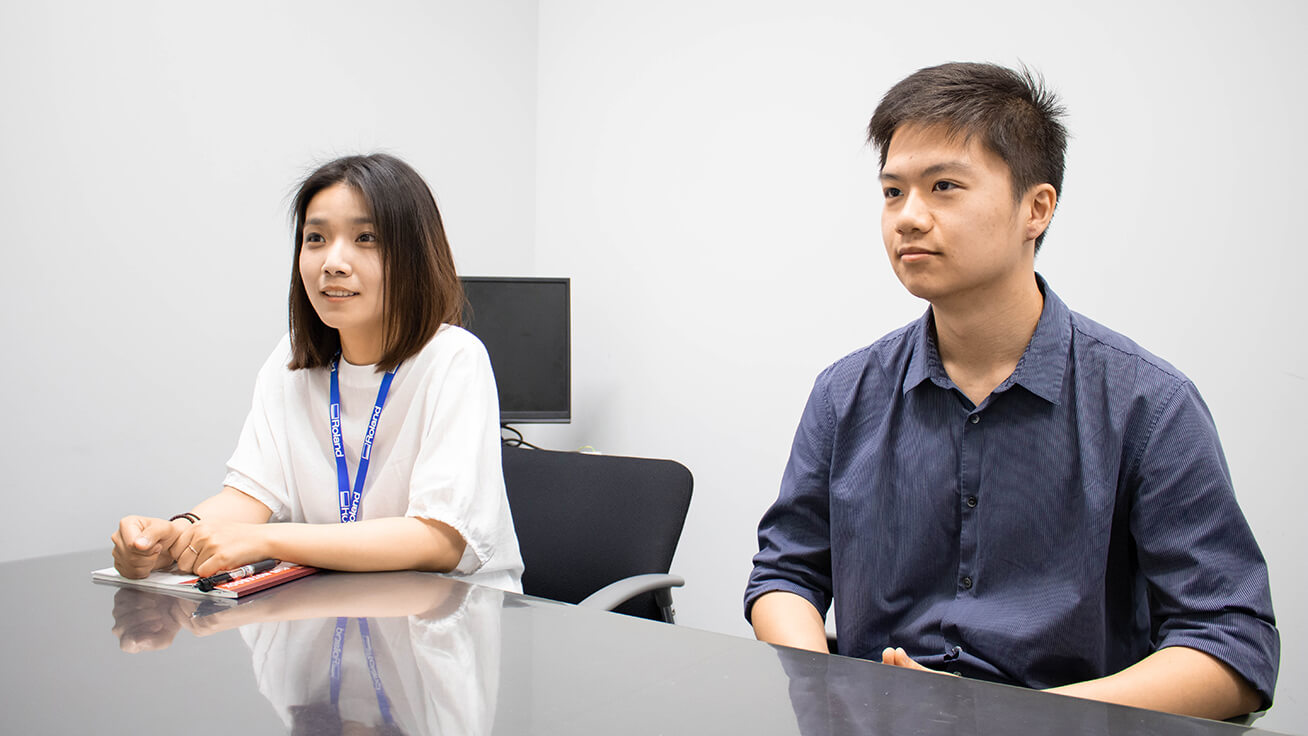 左から、この春ミシガン大学を卒業したJie Chenさん、ミシガン大学3回生のDarren Youngさん