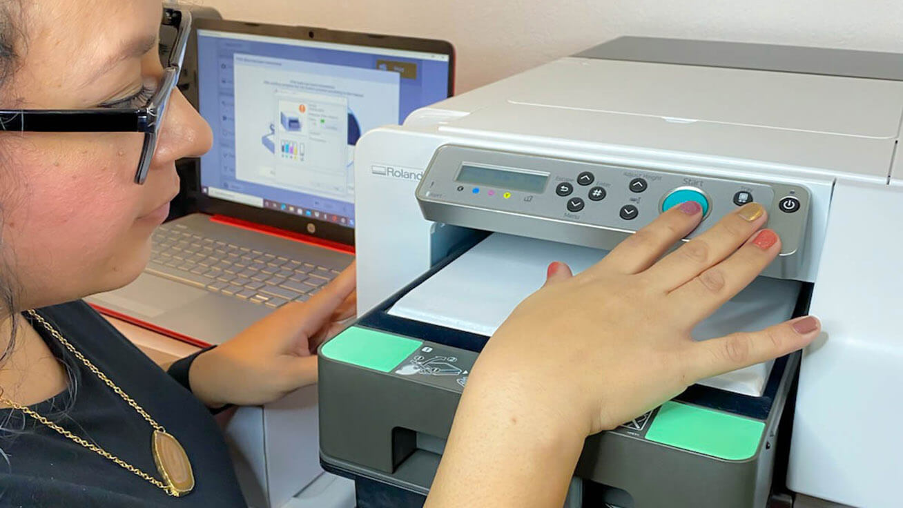 Angela is having fun with the BT-12 printer.