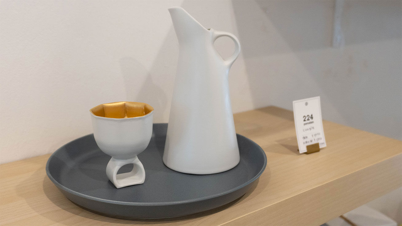 Unique sake serving set designed to slide over your finger like a ring