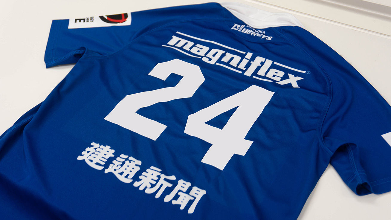 Numbers cut with the SG3-540 are heat-transferred onto uniforms.
