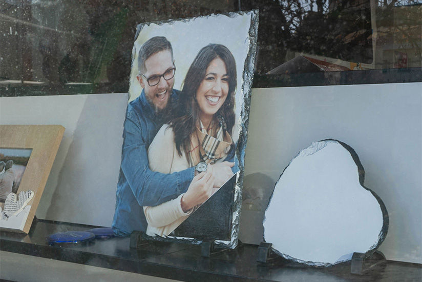 A photo stand printed directly onto stone.