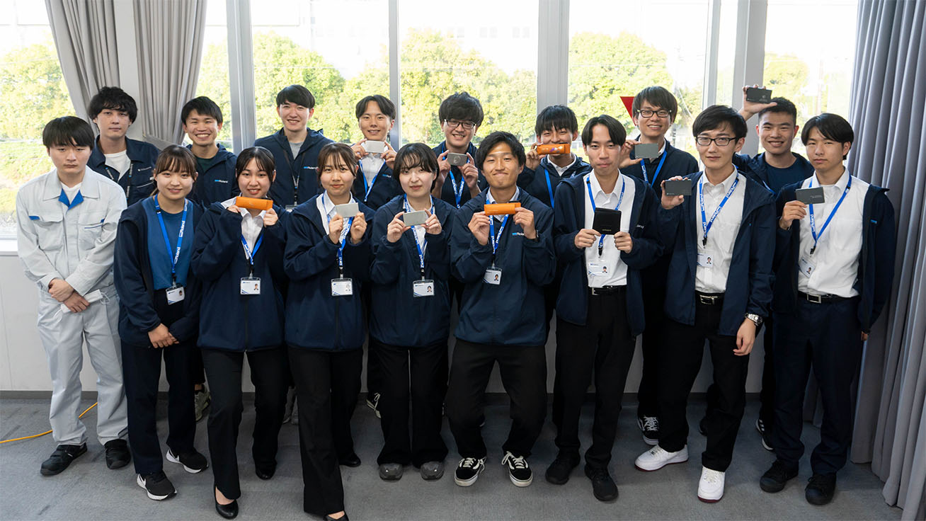 Posing with senior employees who organized and guided the experience session