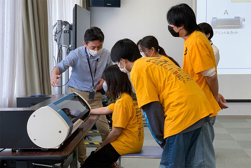 Printing and contour cutting team logos for the uniforms with the compact BN-20A inkjet printer/cutter.
