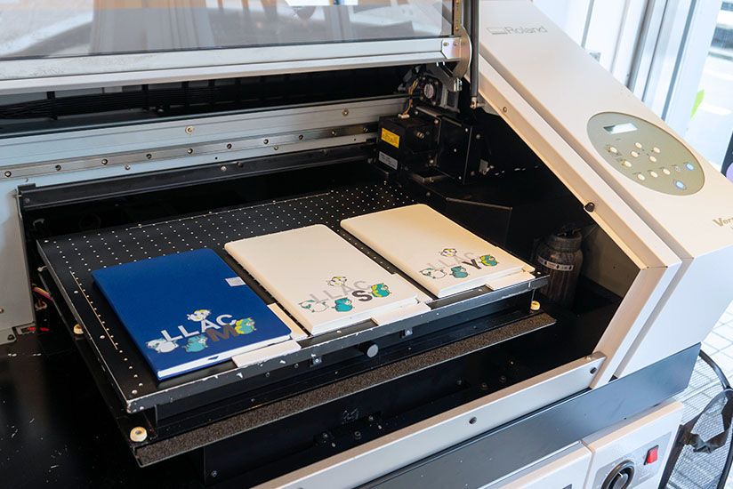 Notebooks purchased at the venue were printed on the spot.