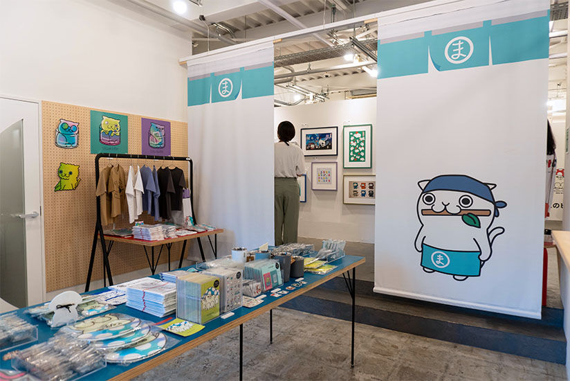 Popular merchandise from the online shop was available for sale at the venue.