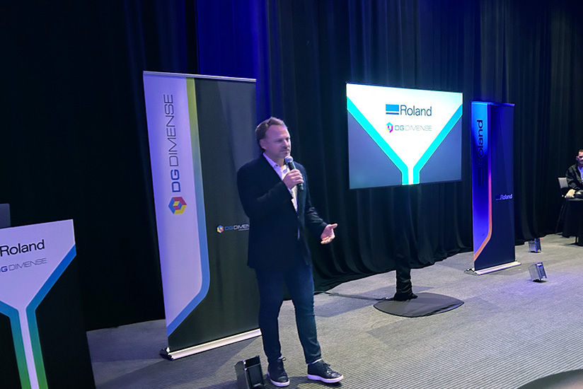 Aleksey greeting attendees at the Hospitality Event