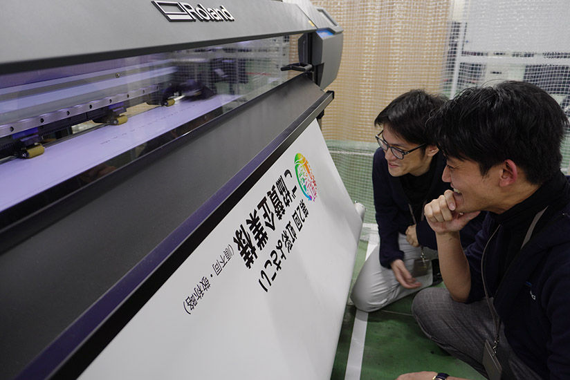 Employee checking printing