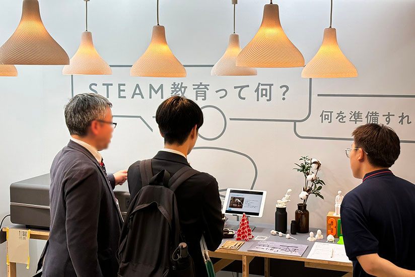 A booth prominently featuring STEAM education