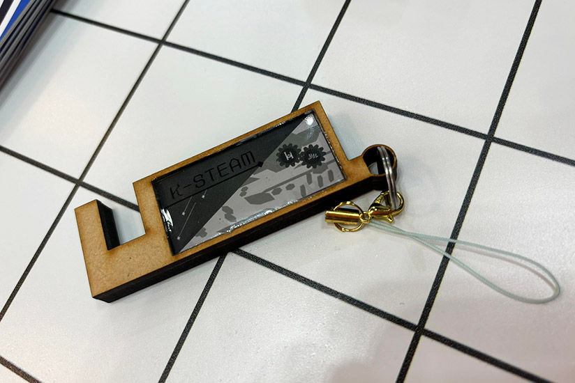 Works combining laser engraving, UV printing, and resin coating