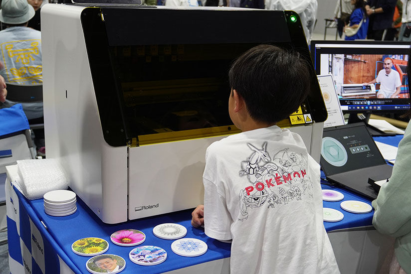 Children observing the printing process