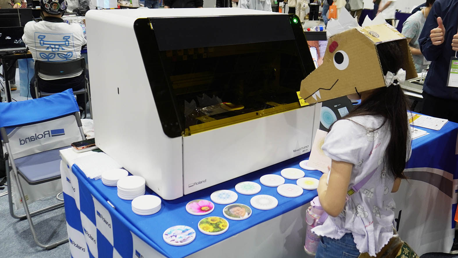 Mesmerized by the printing happening right before their eyes