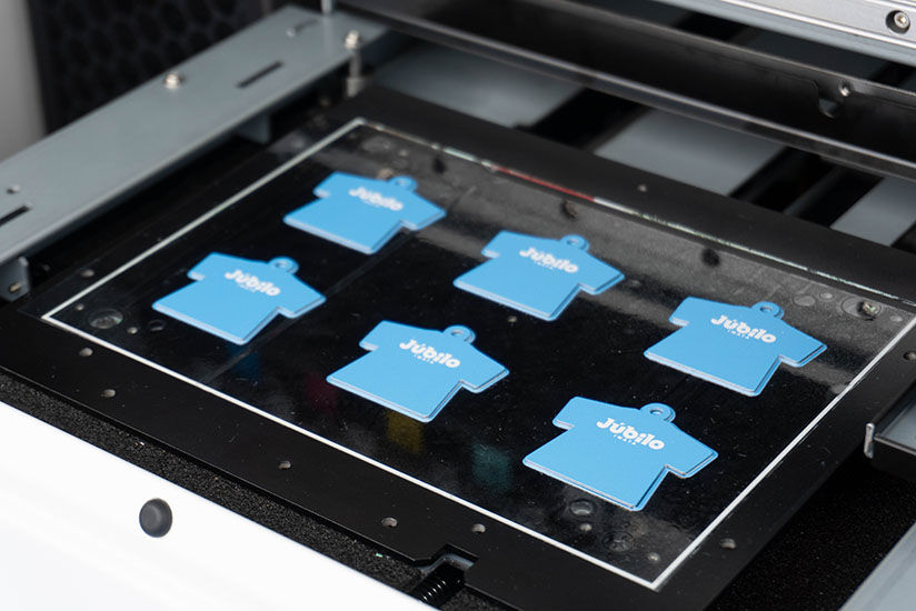 Direct printing on metal keychains