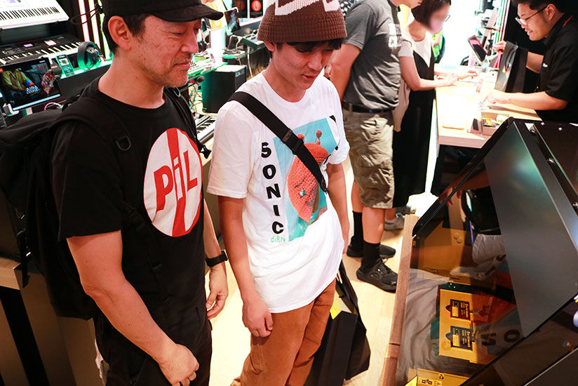 Customer observing personalized printing process