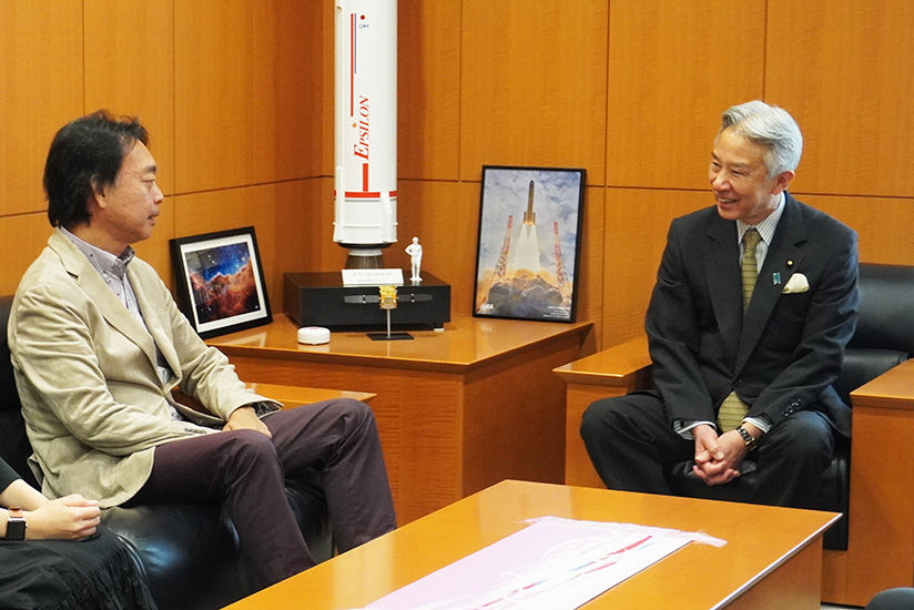 Yoshida having a discussion with the Minister