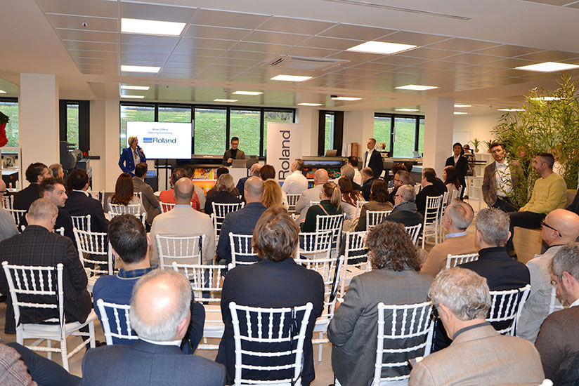 Attendees listening to the speech