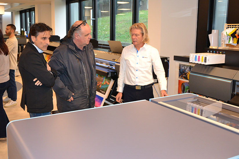 Attendees observing products