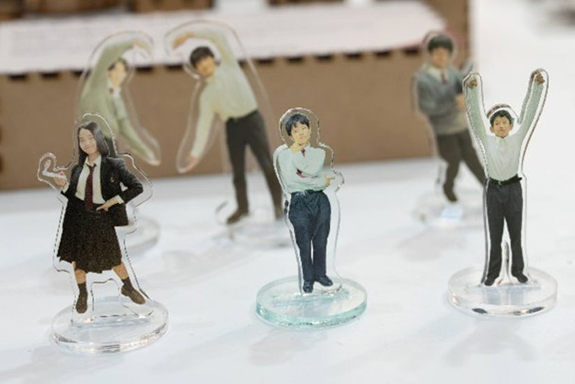 Acrylic stands featuring students