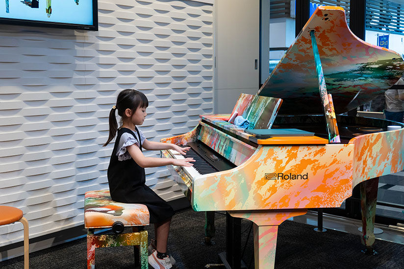 Playing the art-wrapped piano