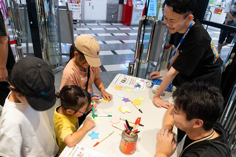 Children writing their impressions of the event