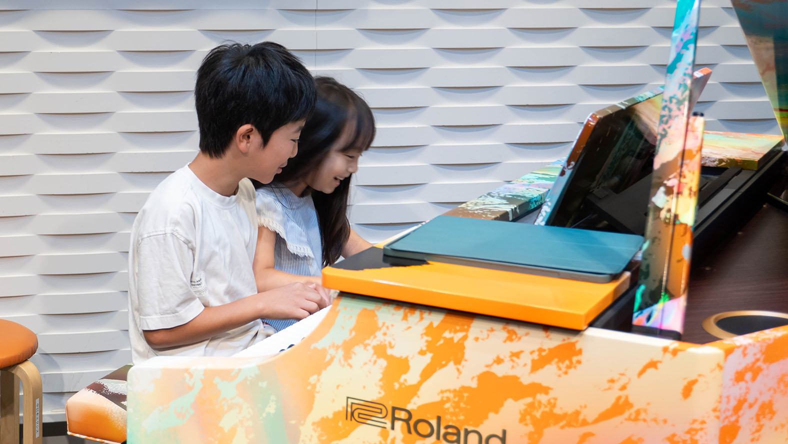 Playing the art-wrapped piano