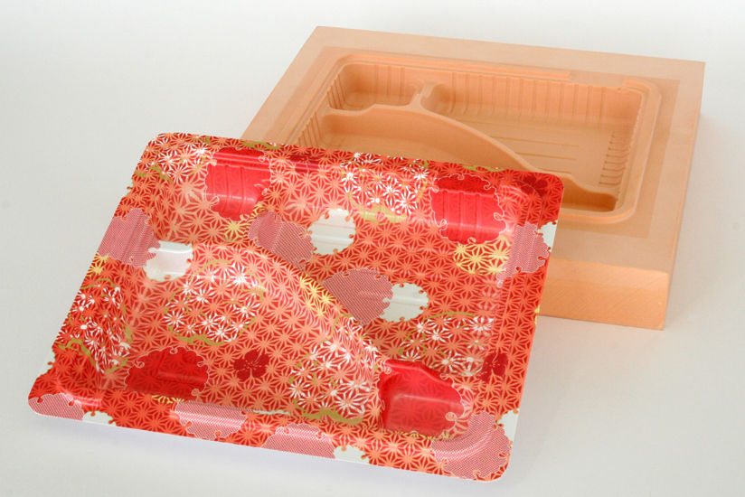 Colorful serving tray prototypes made from vacuum-formed plastic