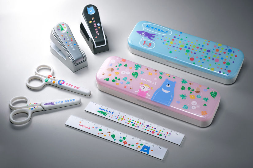 School supplies with children's names and original designs