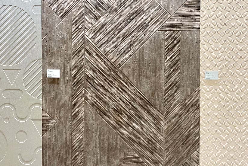 A sampling of textured DIMENSE wallcoverings displayed at the booth