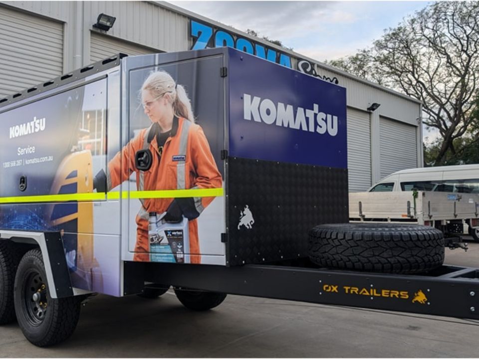 Zooma Signs
