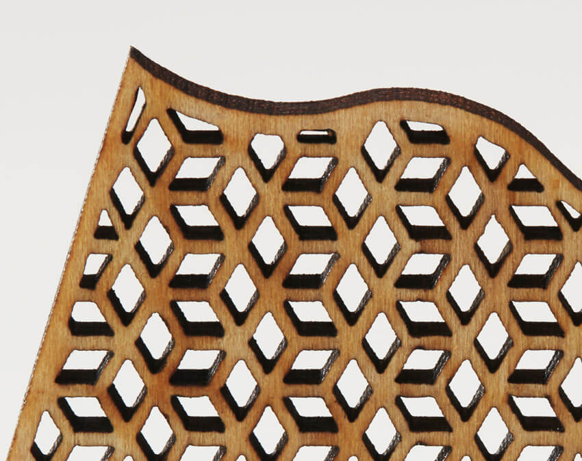 Precision Cutting and Engraving of LV Series - Close up of wood puzzle