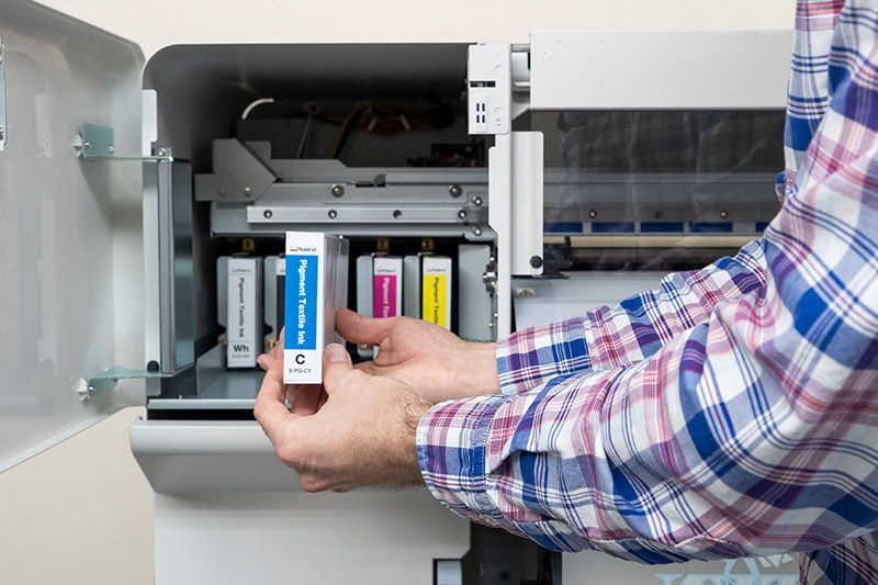 Lady on Computer next to BY-20