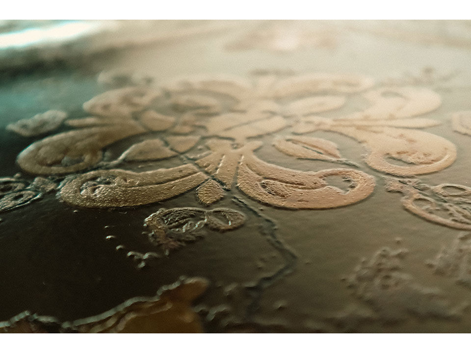 An embossed wall decor printed with DIMENSE DA-640