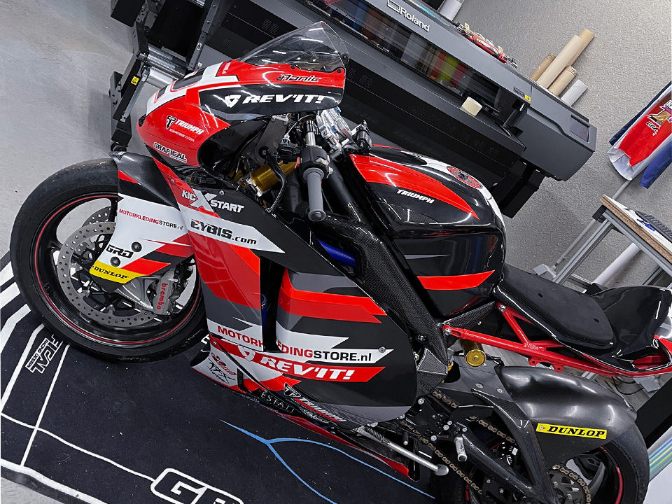 Red race bike wrap by Grafical Racing Design