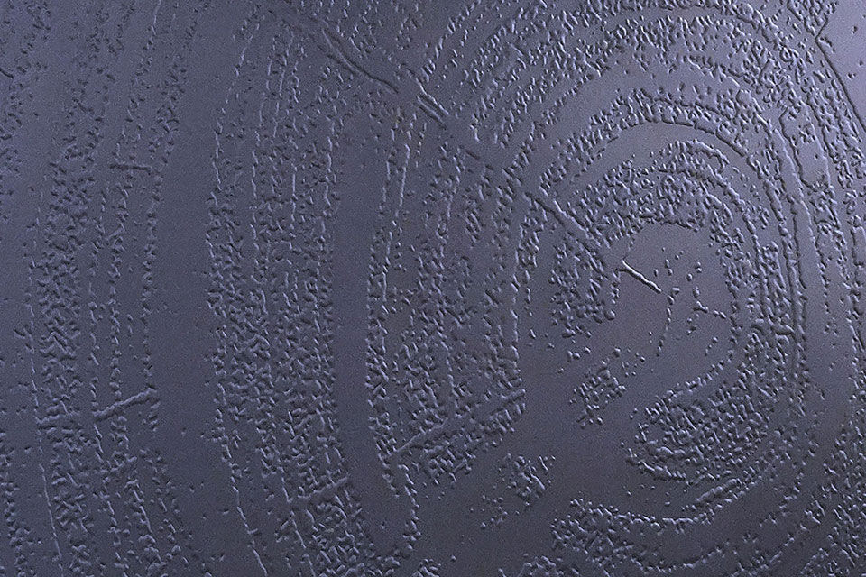 An embossed wallpaper printed with DIMENSE DA-640